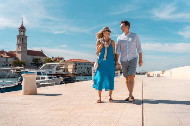 istock Mature Couple Walking in Adriatic Town 2195461445