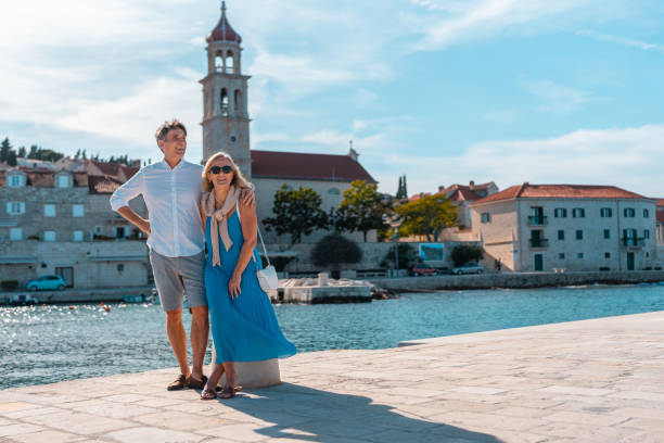 istock Mature Caucasian Couple Enjoys Sunny Sutivan Pier 2195461511