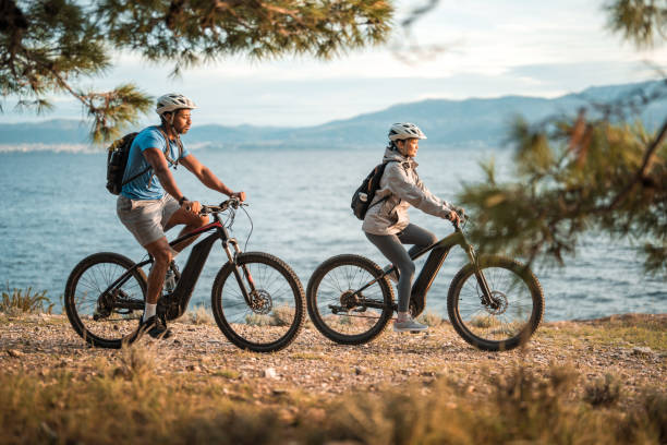 istock Diverse Cyclists Enjoying Coastal Sunrise Ride 2195462136