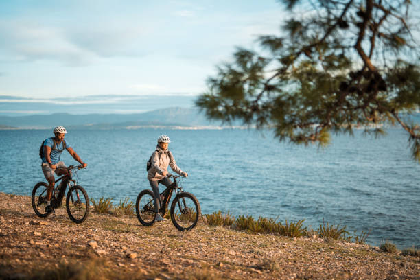 istock Active Duo on Sunrise Mountain Biking Adventure by Adriatic Coast 2195462137