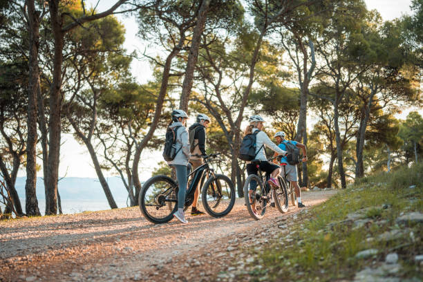 istock Diverse Friends on Sunrise Mountain Biking Adventure 2195462222