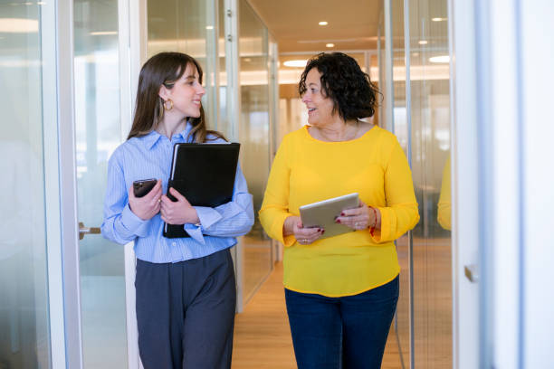 istock Female coworkers in the office 2195462815