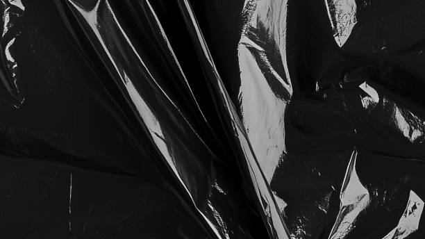 istock Black transparent plastic wrap texture overlay background. Realistic plastic for poster design and photo overlay effect. Wrinkled plastic surface pattern for graphic design sources and element mockup. 2195464705