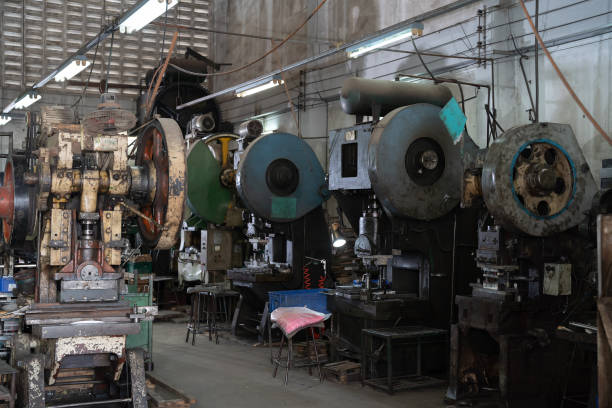 istock Heavy lathe machine at production line in industry factory. Automatic machine for manufacturing industry 2195465609