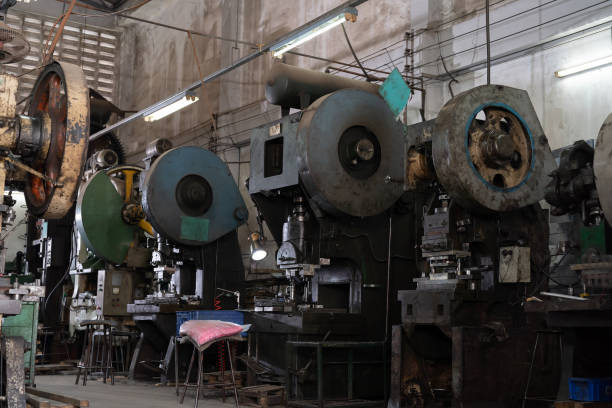 istock Heavy lathe machine at production line in industry factory. Automatic machine for manufacturing industry 2195465615
