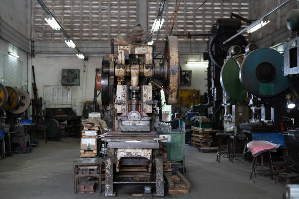 istock Heavy lathe machine at production line in industry factory. Automatic machine for manufacturing industry 2195465624