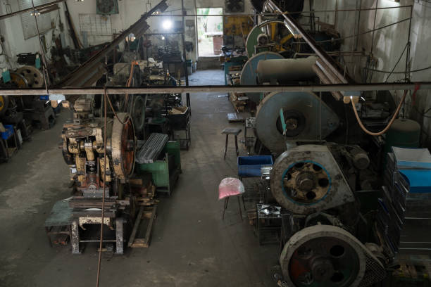 istock Heavy lathe machine at production line in industry factory. Automatic machine for manufacturing industry 2195465940