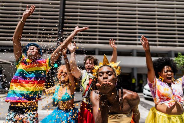 istock Friends having fun at the street carnival 2195466659