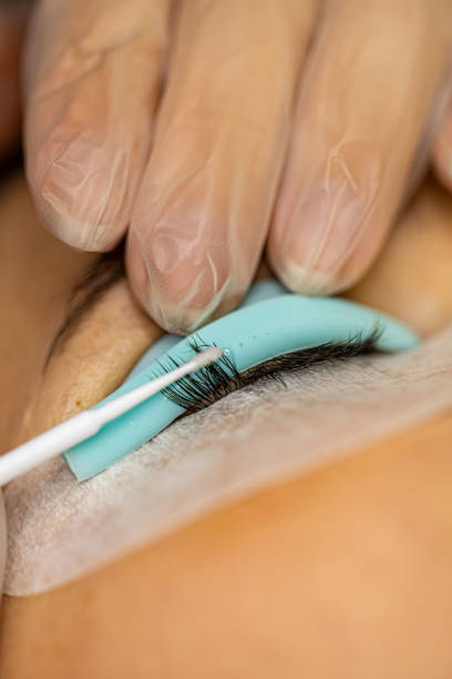 istock The make-up artist does eyelash lamination 2195469679