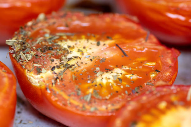 istock A slice of tomato with herbs on top 2195478687