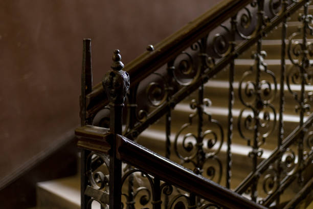 istock Ornamental Iron Stair Railing in Historic Building 2195480011