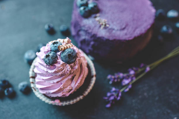 Colorful cakes on a dark background, beautiful picture.
