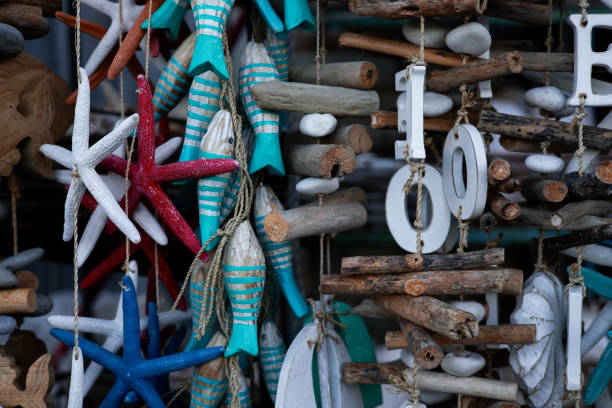istock Colorful nautical decorations with driftwood and starfish display 2195482818