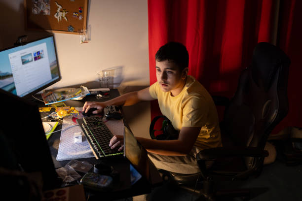 Autistic Computer Kid 470+ Disabled Teen Boy Online Stock Photos, Pictures & Royalty-Free ...