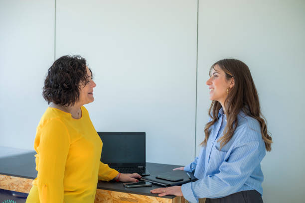 istock Female coworkers in the office 2195496663