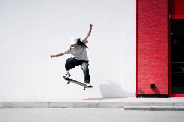 Teenagers skateboarding together