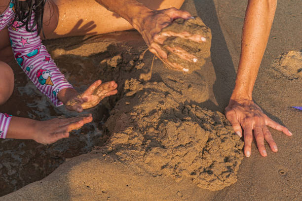 istock Building Sandcastles at the Beach 2195500712