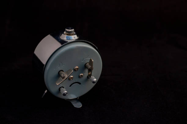 Back View of Vintage Alarm Clock with Wind-Up Mechanisms