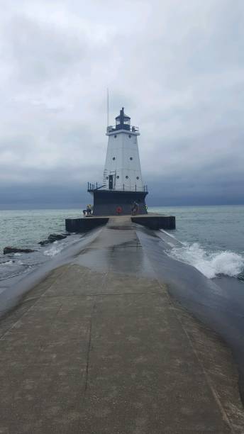istock Lighthouse on lake in Michigan 2195507632