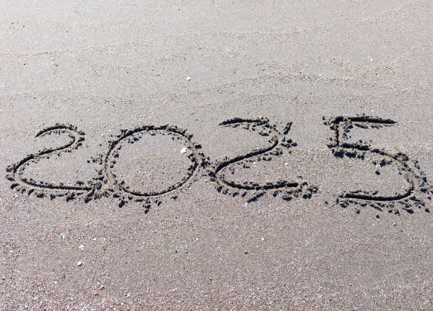 istock The year 2025 written on a beach 2195510448
