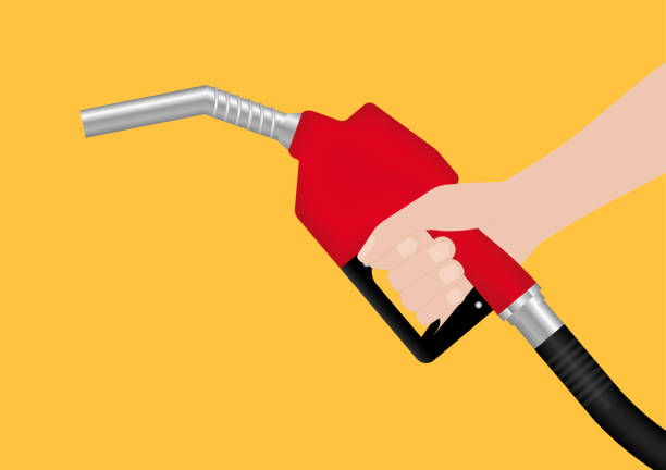 istock Hand Holding Gas Pump or Fuel Nozzle. Gas Station. 2195515207