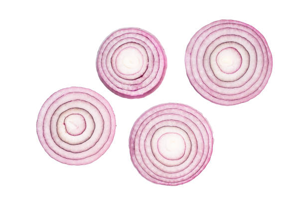 Sliced red onion rings on white background
