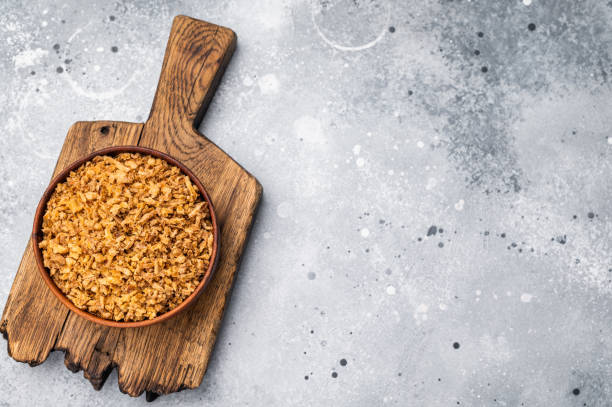 istock Crispy Fried Onion, Roasted dried Onions. white background. top view 2195519025