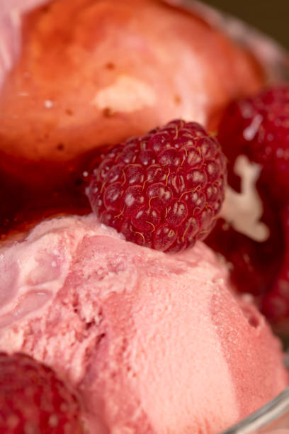 istock red raspberry ice cream in a glass bowl with raspberry jam 2195522293