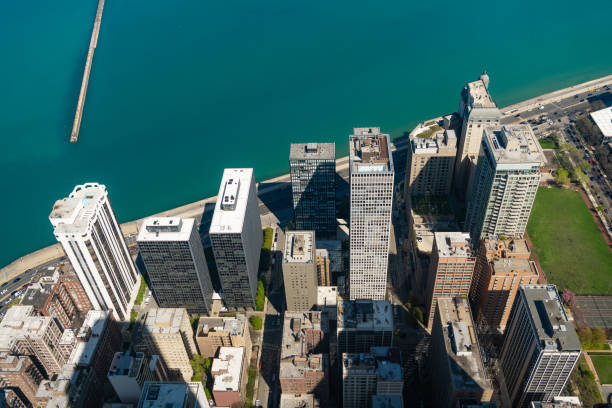 istock architectural building in metropolis. skyscraper architecture of chicago seaside city. metropolis city skyline. aerial view on downtown cityscape. skyscraper aerial view. cityscape skyline seafront 2195522823
