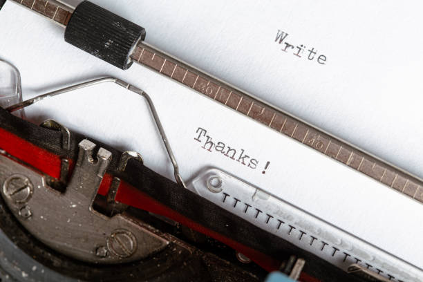 istock Thanks word written on a white paper with an old typewriter machine 2195525700