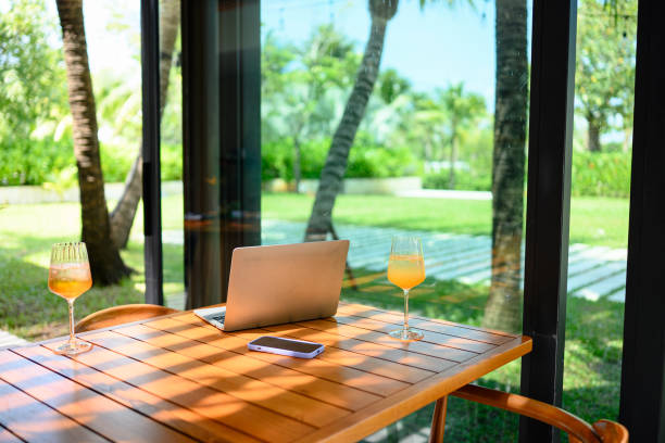 istock Cozy Remote Work Setup in Tropical Paradise Bar 2195526172