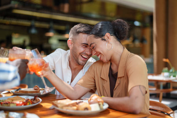 istock Cheerful Multiracial Couple Enjoying Breakfast Together 2195526316