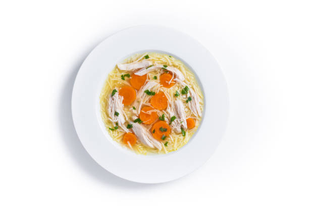 istock Homemade chicken soup isolated on white background 2195527839