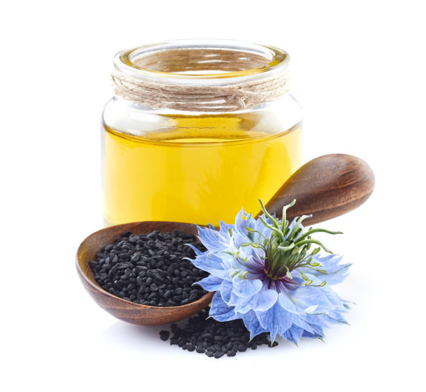 istock Black cumin oil on white background 2195550035