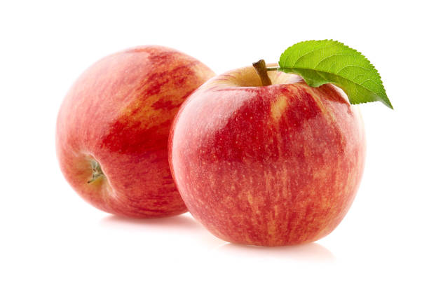 istock Apples in closeup on white background 2195550084