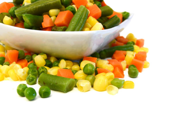 istock Fresh mixed vegetables on white. Golden mix. 2195555335