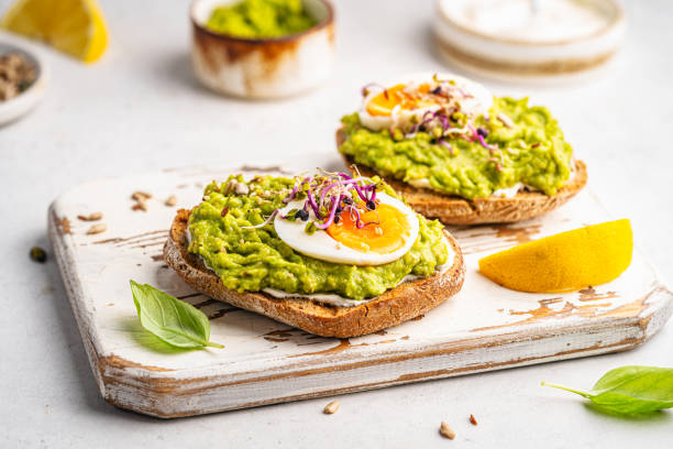 Toast with avocado stock photo