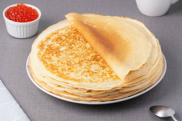 istock Freshly baked pancakes with red caviar 2195557811
