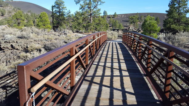 istock Foot bridge to dormanttrail volcano. 2195560434