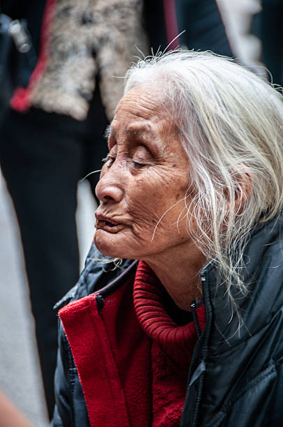 Hanoi, Vietnam - nov 25, 2013 : wrinkles furrow the face of an elderly woman from Hanoi, Vietnam, on Nov 25, 2013.