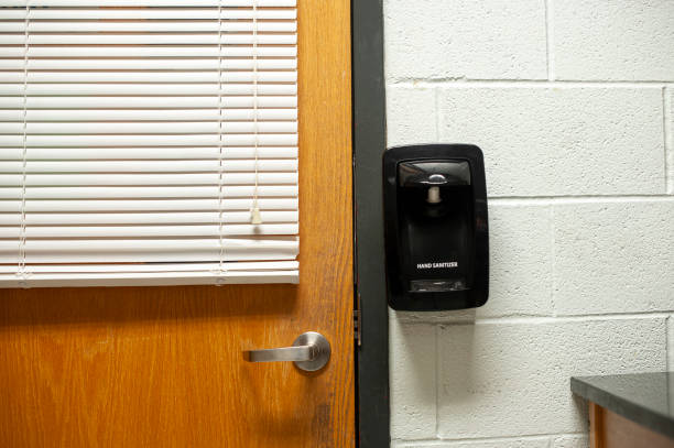 istock Wall Monted Hand Sanitizer in School 2195562534