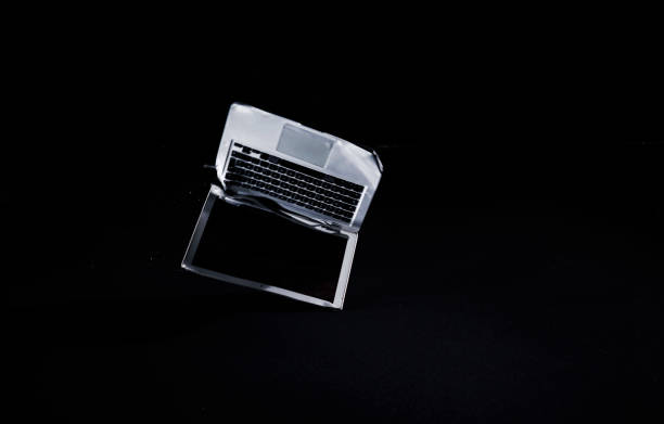 istock Device crashing on the floor, a smashed and broken laptop, locked down shot 2195563421
