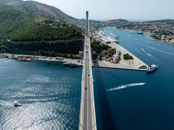 Panorama of impressive Franjo Tudjman bridge and blue lagoon with harbor of Dubrovnik in Dubrovnik, Dubrovnik-Neretva County, Croatia, Europe.
