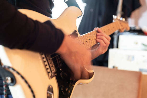 istock Rock musician practicing, playing electric guitar 2195564398