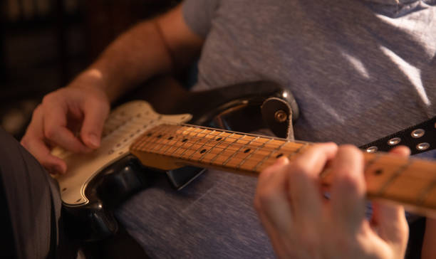 istock Rock musician practicing, playing electric guitar 2195564524