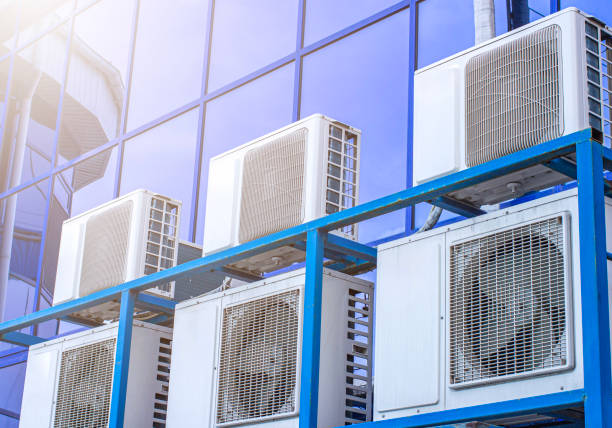 istock air conditioner on a building attached to a glass facade 2195565224