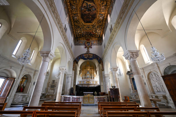 Gravina, Italy - Aug 7, 2023: The ancient Santa Maria Assunta cathedral in the downtown of the picturesque Italian town of Gravina in Puglia, Bari, Italy.