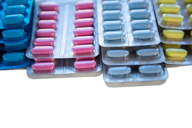 istock Close up pharmaceuticals, High angle view of blister packs on table 2195567990