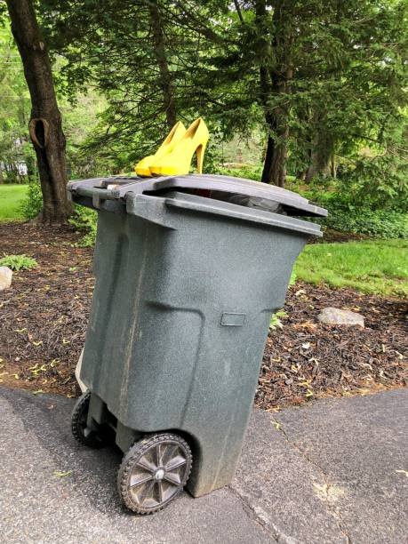 istock Trash receptacle  with discarded stiletto shoes 2195573611