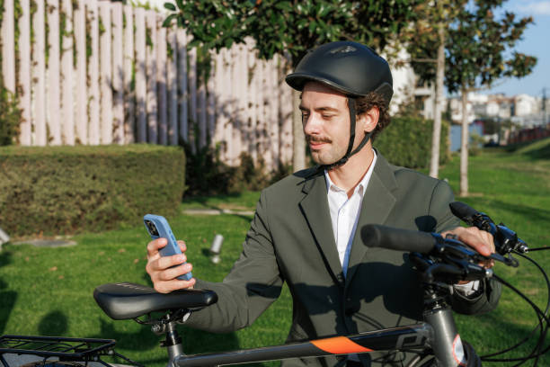 istock An eco-friendly commuter using his phone outdoors 2195574811